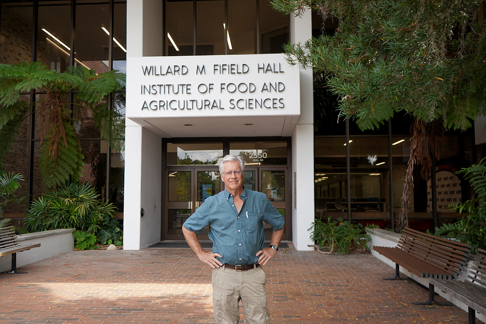 Dr. Jeffrey Williamson working in a blueberry field